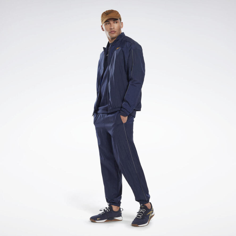 Imagen CHANDAL REEBOK ID TRAIN MARINO TRACKSUIT HL4286