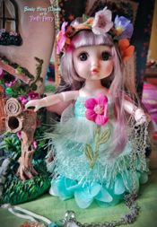 miniatura El Hada de los Dientes junto al buzón mágico de su casita