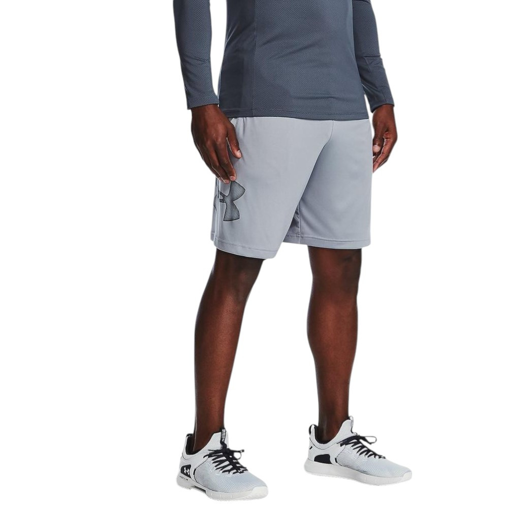 Imagen SHORT UNDER ARMOUR TECH GRAPHIC GRIS 1306443-035 RUNNING HOMBRE