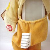 miniatura PELUCHE MUÑECO PAYASO EN MONOPATIN PATINETE A PILAS CON DESPLAZAMIENTO MARRON NARANJA